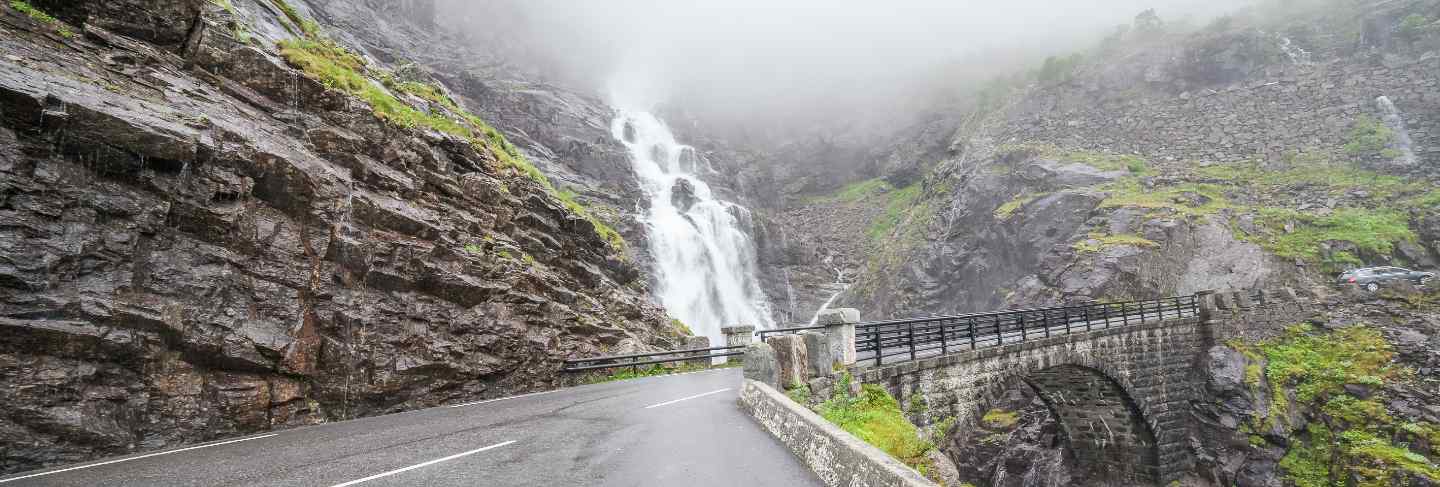 Trolls path trollstigen or trollstigveien scenic mountain road in norway europe. waterfall and bridge. national tourist route