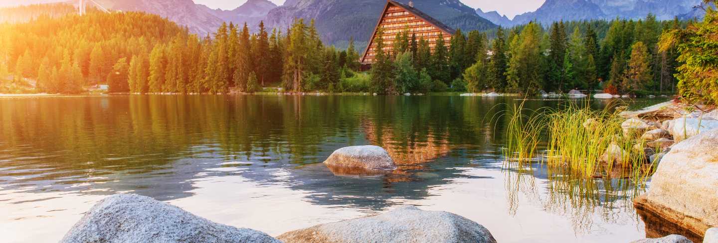 The sunrise over a lake in the park high tatras. strbske pleso,