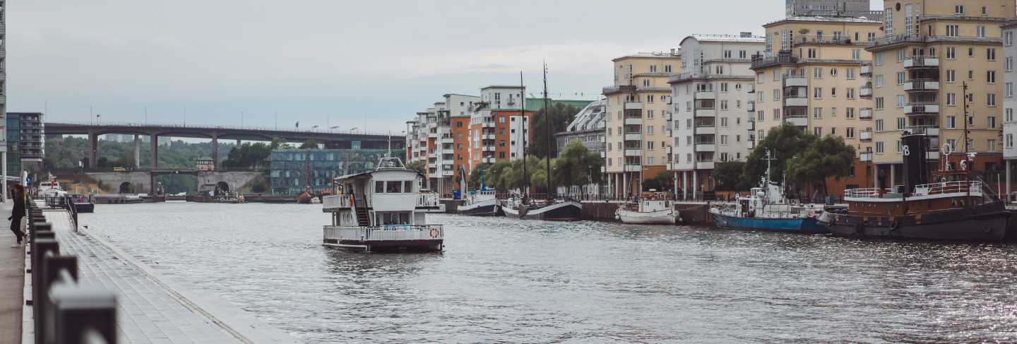 Sailing boats and yachts on the pier in stockholm front of the city center
