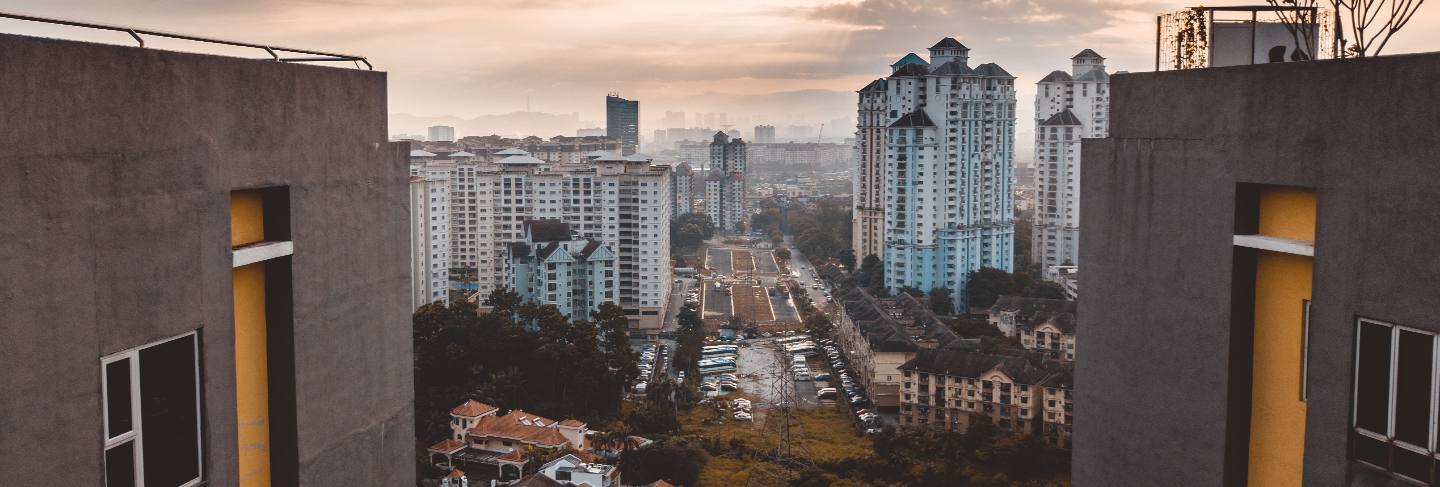 Beautiful shot of the kuala lumpur buildings under a cloudy sky at malaysia