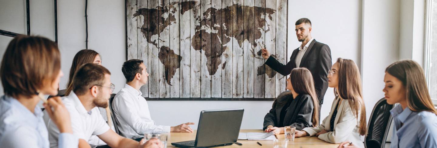 Group of people working out business plan in an office