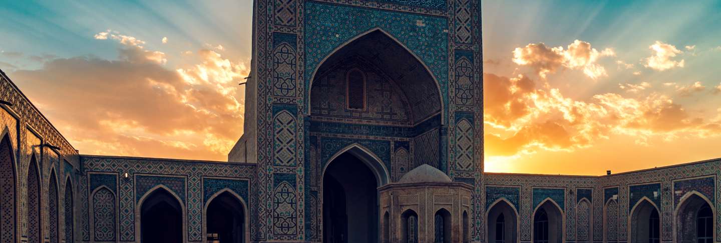 Courtyard of kalyan mosque at sunset, bukhara, uzbekistan