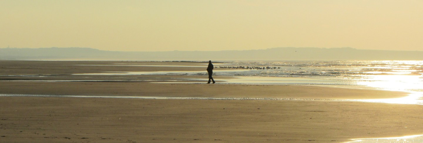 Beach evening pas de calais france man market