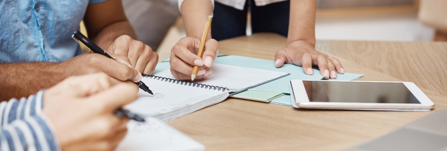 businessmen hands on white table with documents and drafts
