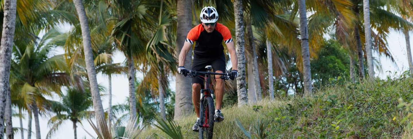 A cyclist rides a mountain bike in the dominican republic