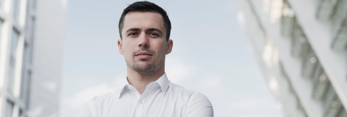 Corporate man with crossed arms