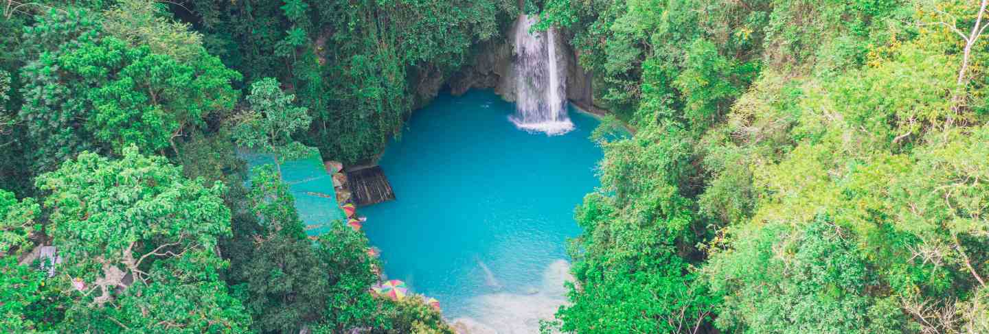 The azure kawasan waterfall in cebu. the maining attraction on the island. concept about nature and wanderlust traveling