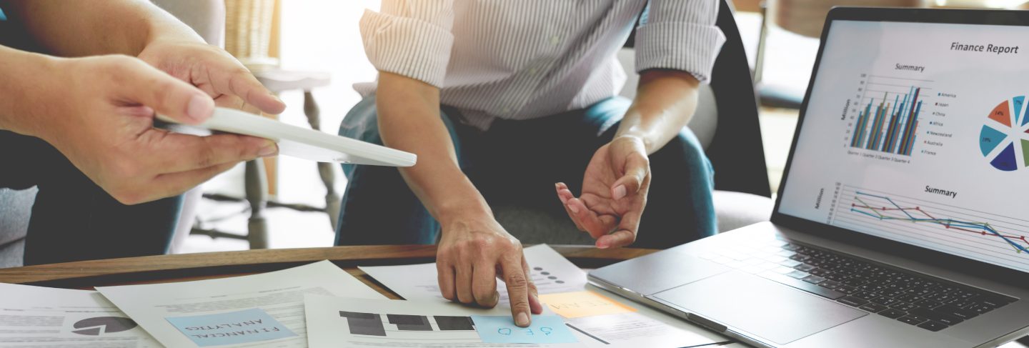 businessmen hands on white table with documents and drafts
