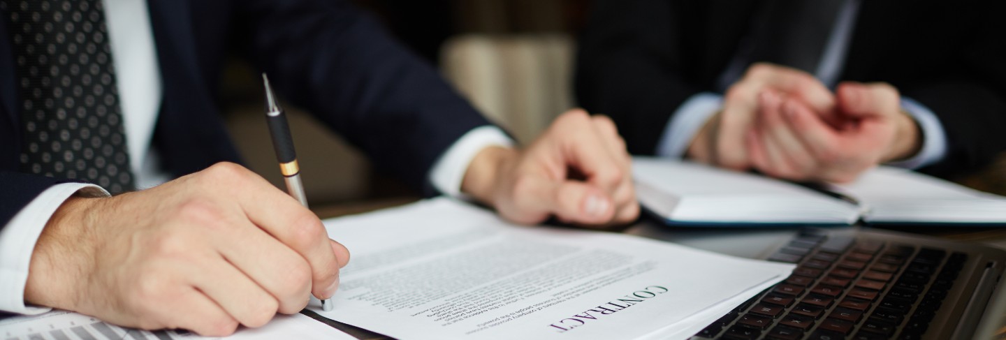 Businessman reading contract closeup