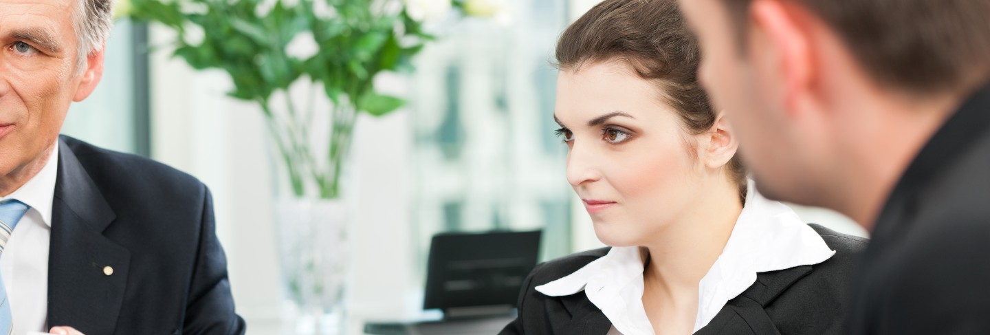 Business people - team meeting in an office
