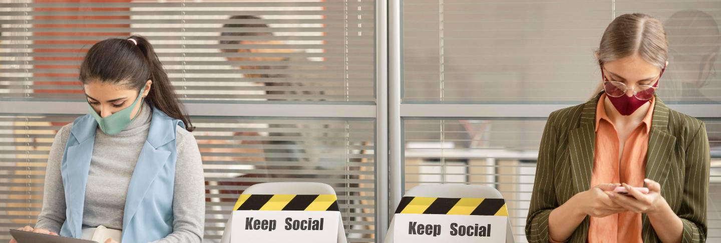 Employees respecting social distance at work