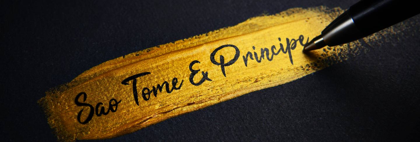Sao tome and principe handwriting text on golden paint brush stroke