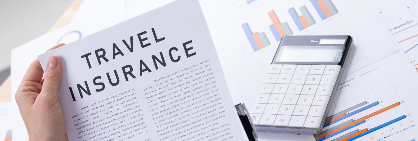 Travel insurance concept, documents on the desktop