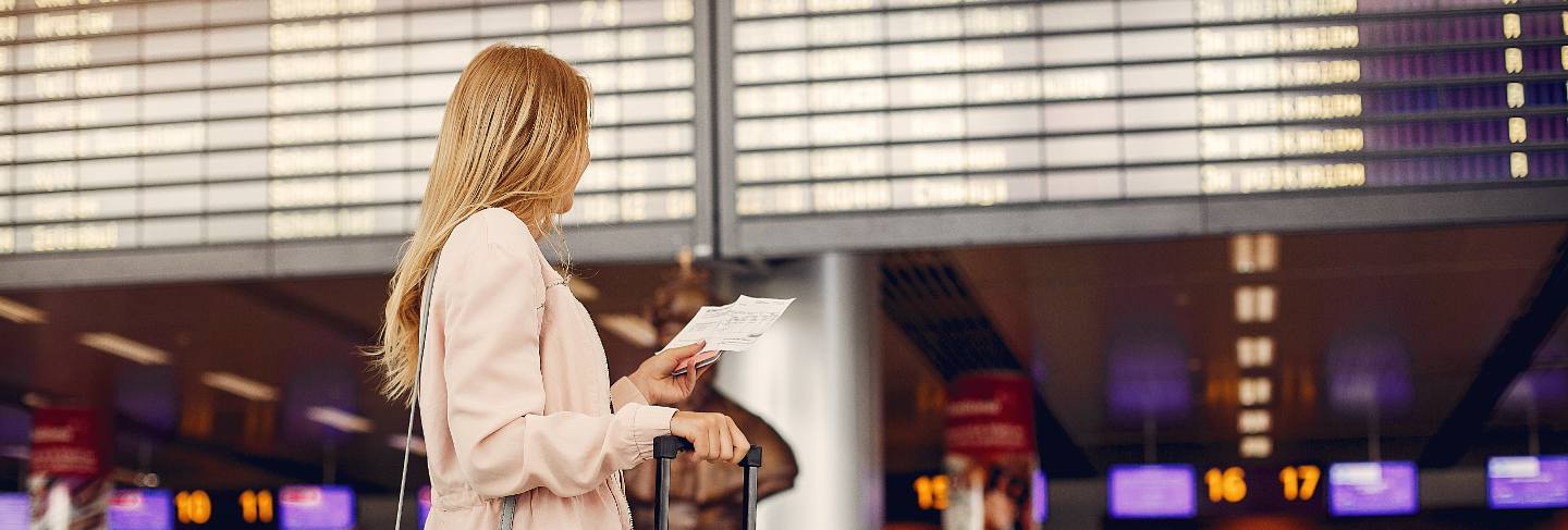 Beautiful girl standing in airport