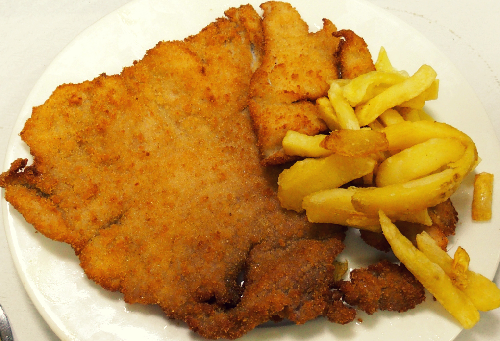 El escalope se sale del plato. El escalope se sale del plato.