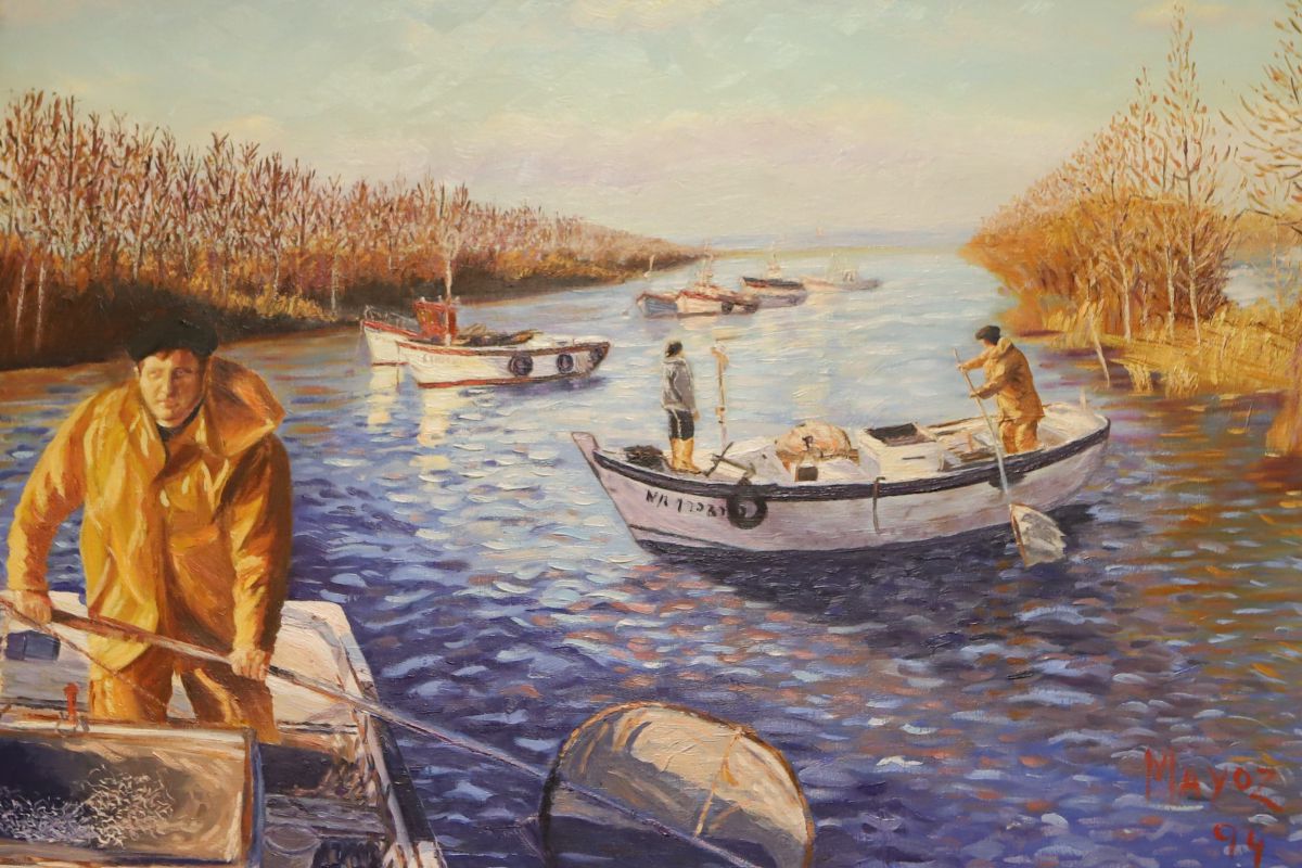 Una pintura en 'Angulas Mayoz' homenajea la pesca de angulas. Una pintura en 'Angulas Mayoz' homenajea la pesca de angulas.