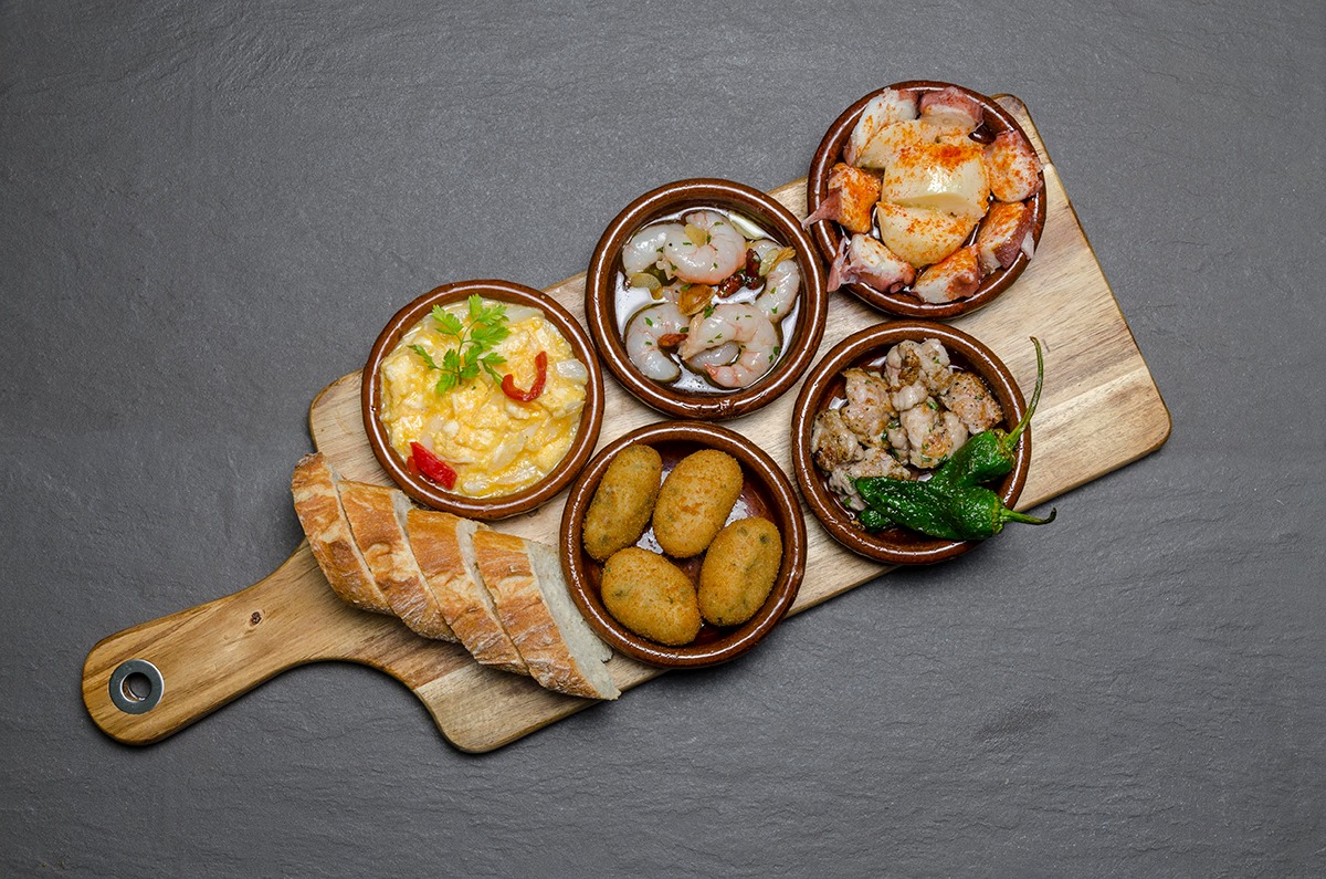 Tabla con algunas de las tapas más célebres de 'Sancho2-La Marina'. Foto: Facebook 'Sancho2-La Marina'. Tabla con algunas de las tapas más célebres de 'Sancho2-La Marina'. Foto: Facebook 'Sancho2-La Marina'.