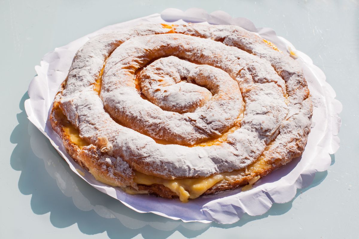Una deliciosa ensaimada de crema para ponerle un punto dulce a la jornada. Foto: Shutterstock. Una deliciosa ensaimada de crema para ponerle un punto dulce a la jornada. Foto: Shutterstock.