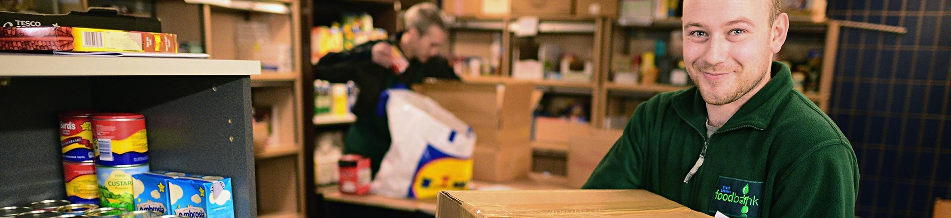 A volunteer working in a Trussell Trust food bank