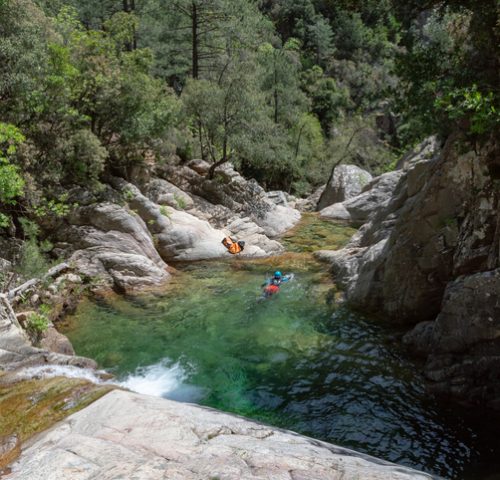 People enjoying cannoying in Purcaraccia canyon in Corsica, France. People enjoying cannoying in Purcaraccia canyon in Corsica, France.