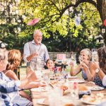 Family celebration or a garden party outside in the backyard. Family celebration or a garden party outside in the backyard.