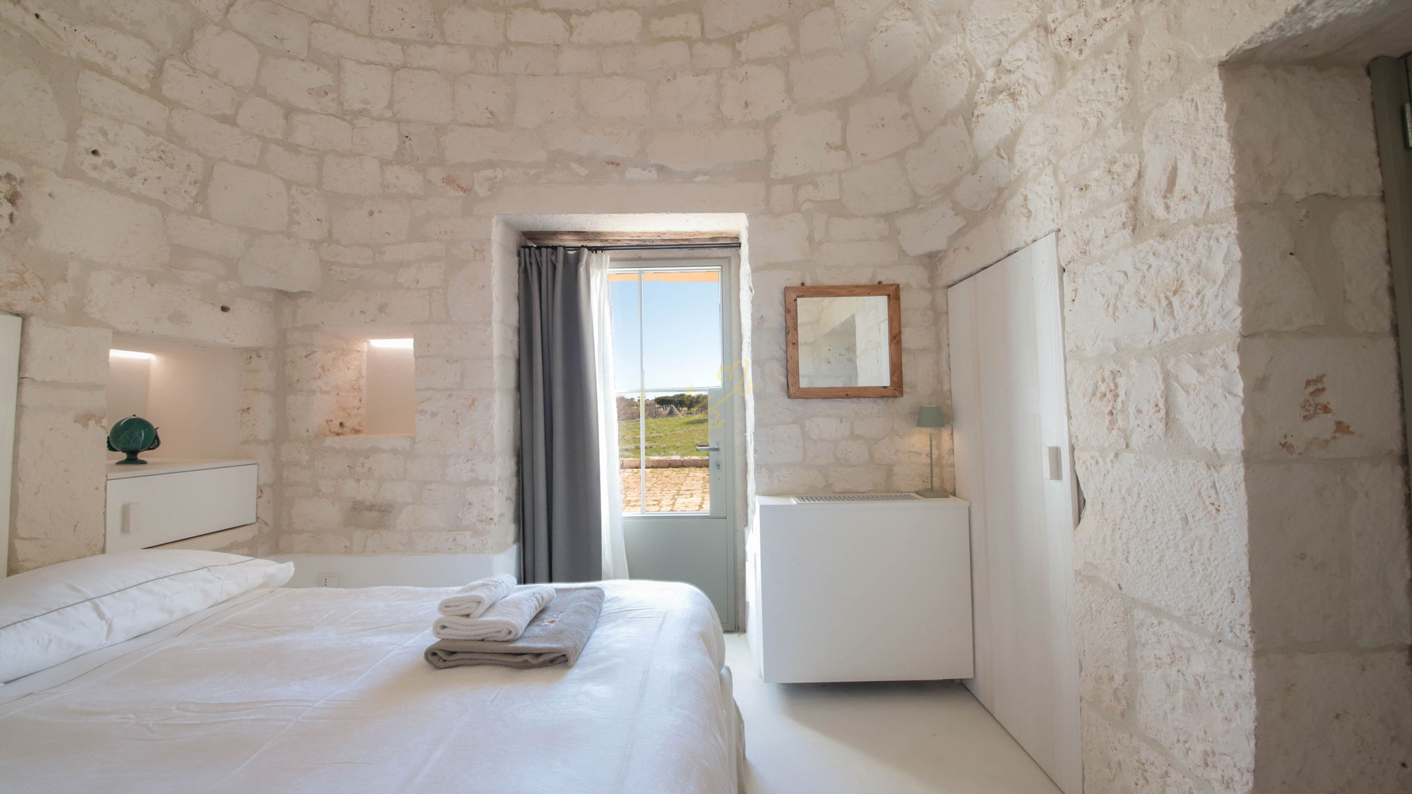 Trulli e Dimore Property Management Martina Franca TD I Coni di Pinurè Trulli with Scenic Valley View