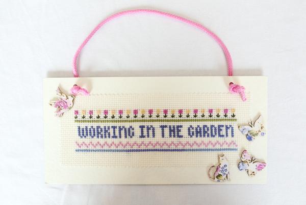 Make this cross stitch sampler garden sign in our sewing series