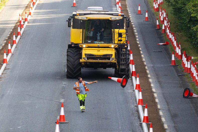 Combines forced to divert from main road over new cycle route