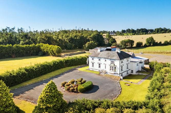 Luxury lakeside estate with 19th-century mansion