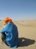Klik om te vergroten Gerben met z\'n super mooie oranje tulband in de dessert