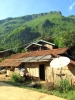 Een typische huisje in laos, incl. satteliet