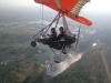 Karina in de microlight boven de Victoriawatervallen.