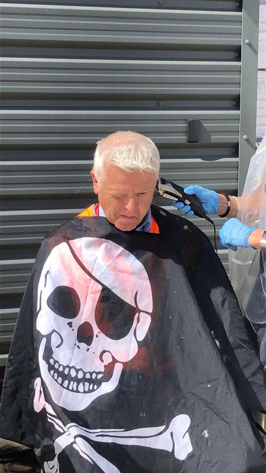 Go North East operations manager Malcolm Davis having his hair shaved off to raise funds for University Hospital of North Durham's children's ward