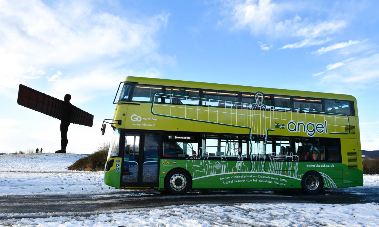 Angel bus in the snow near the Angel of the North
