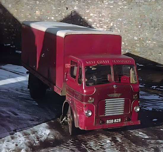 burgundy van in snow