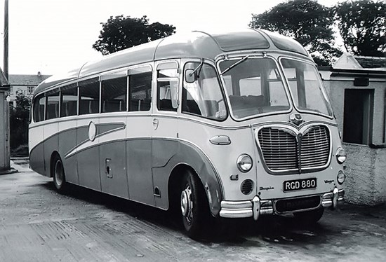 1970s bus small black and white photo