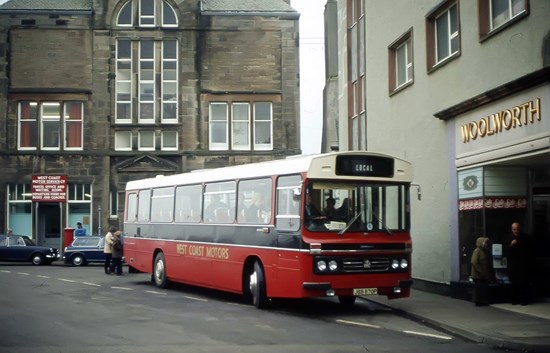 coloured photo of 1980s bus