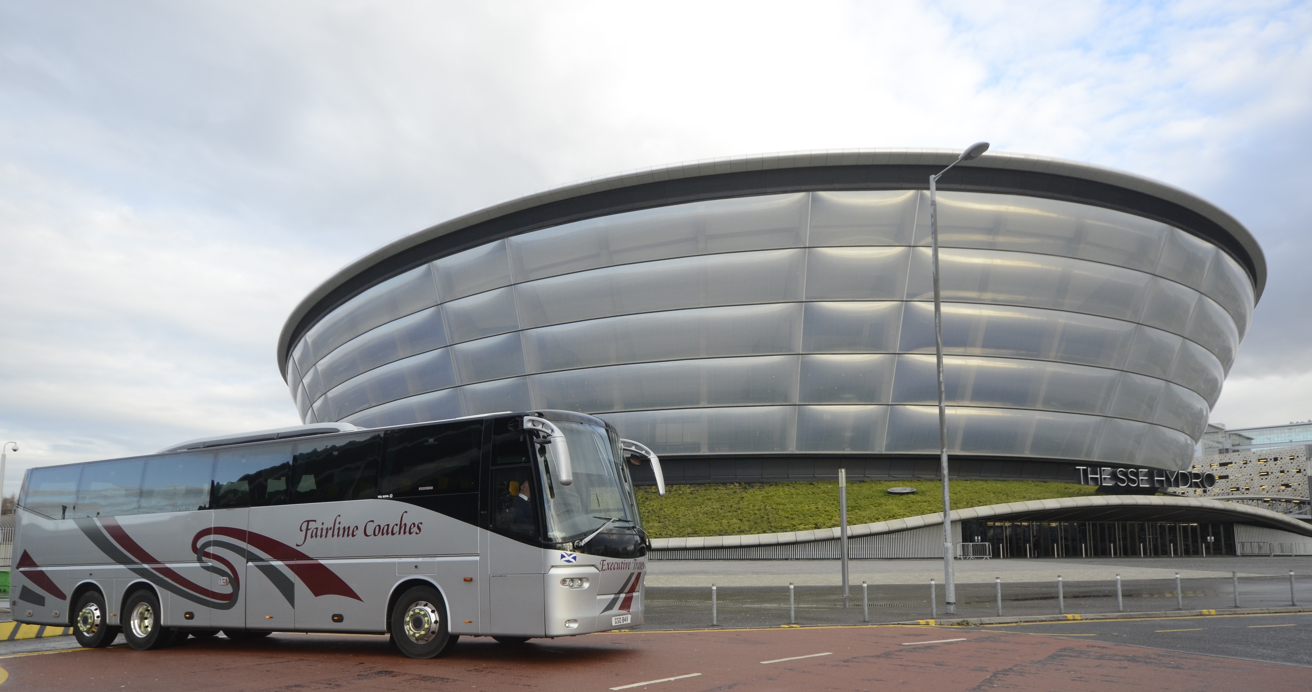 silver coach in front of Hydro