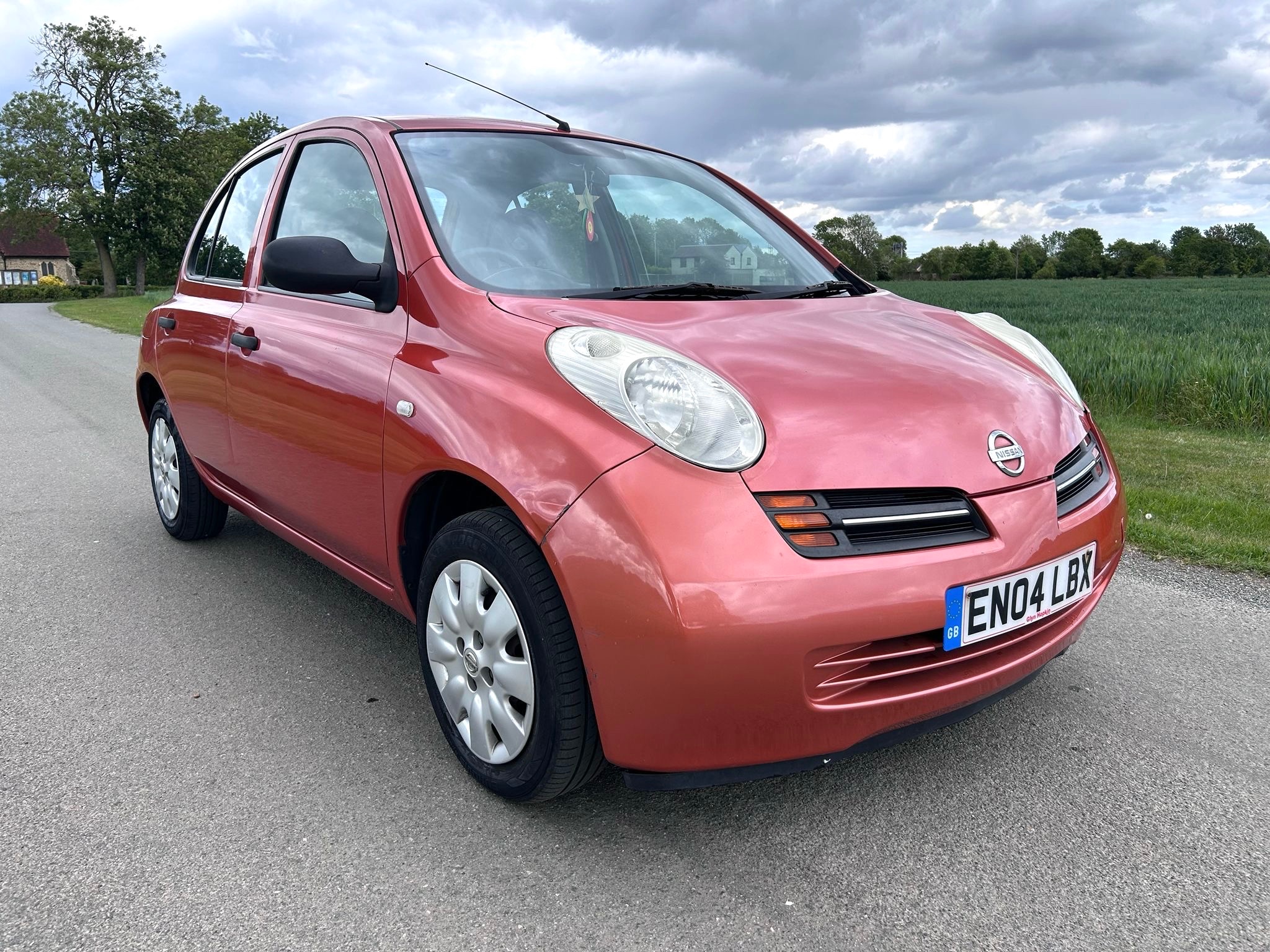 Red 2004 Nissan Micra 1.2 S 5d Hatchback Front-wheel drive Manual