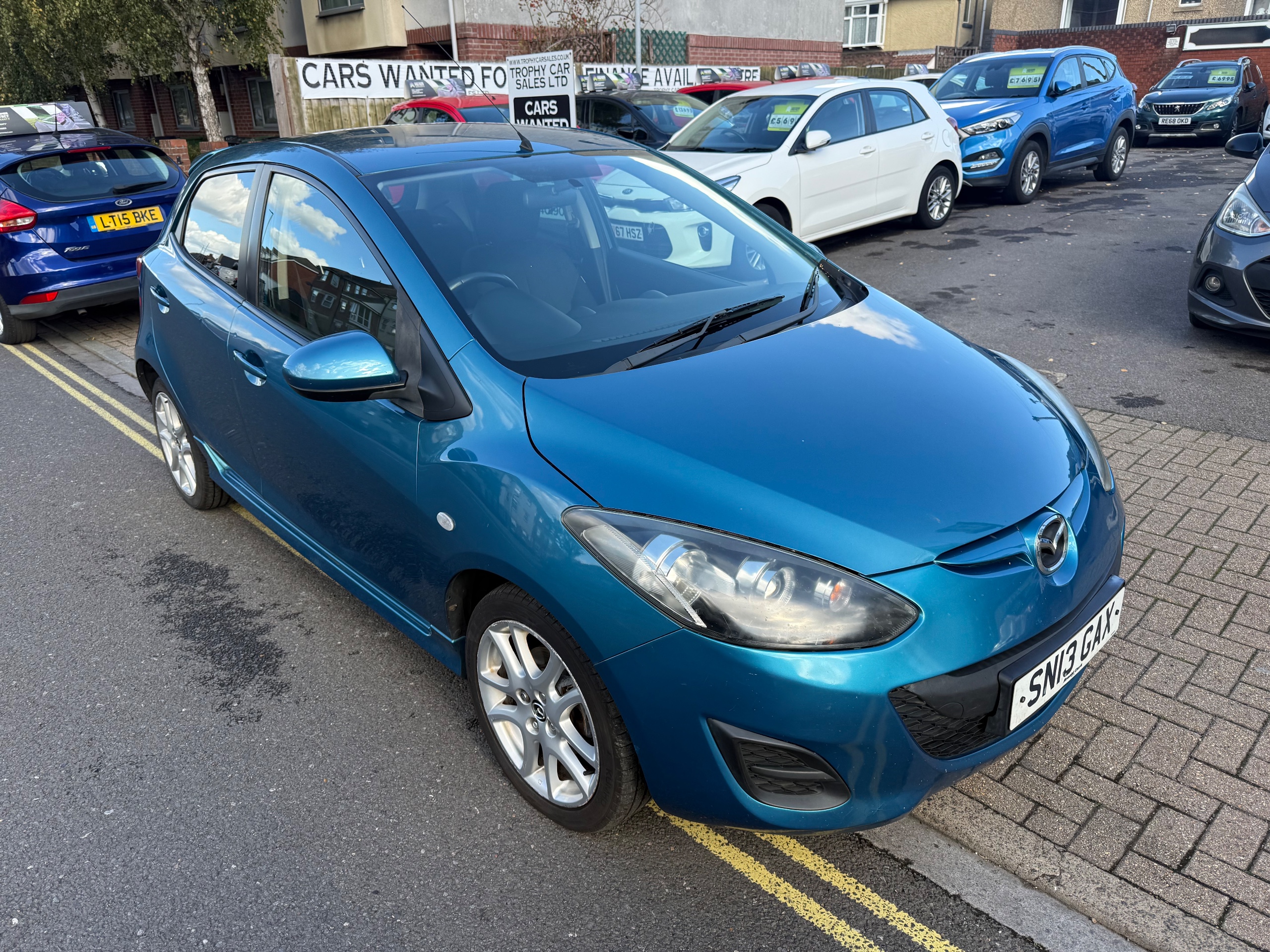 Blue 2013 Mazda Mazda2 Hatchback Front-wheel drive Manual