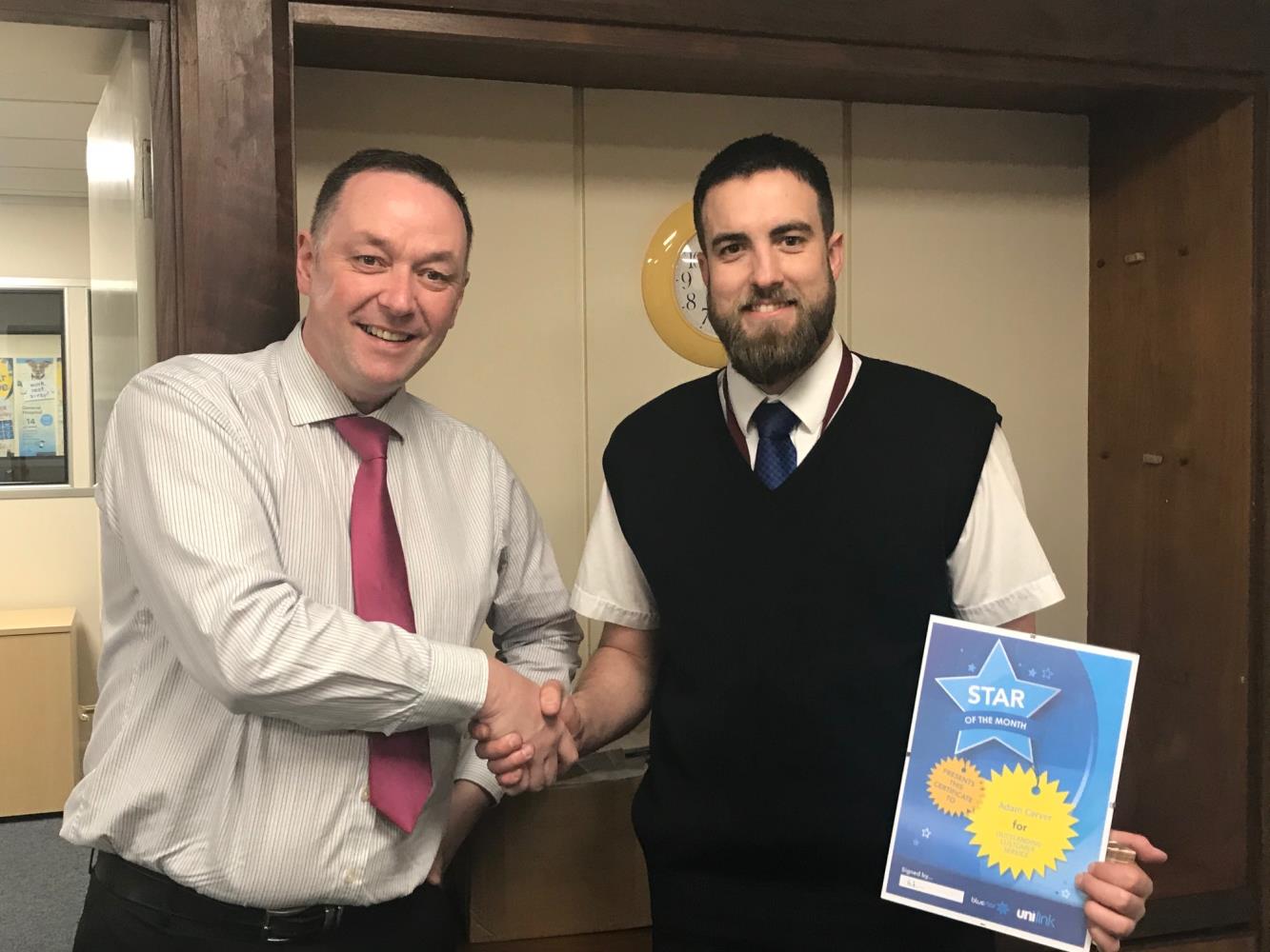 Operations Manager Andy Shaw and winner Adam Carver