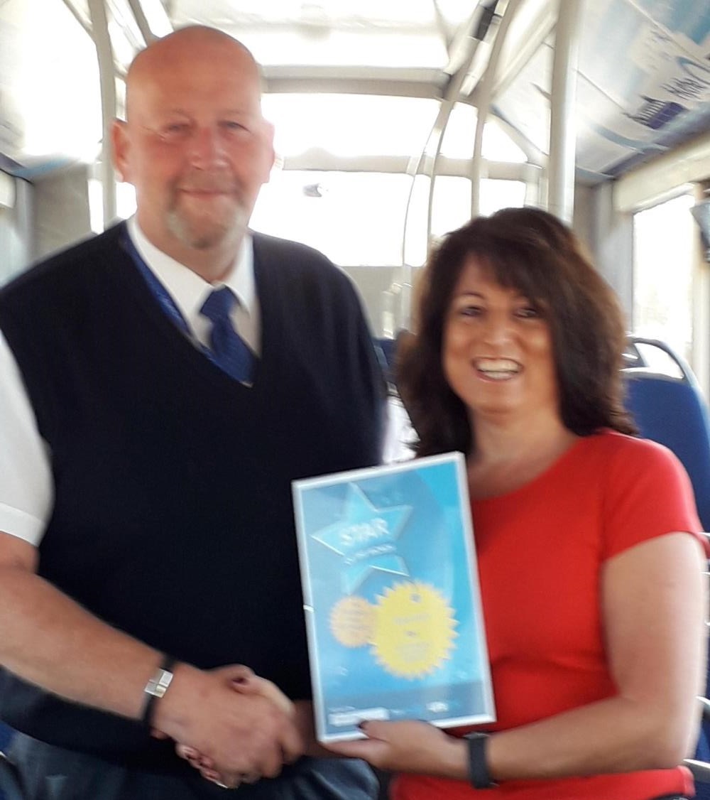 Ops Manager Chyrsie Papanicolaou and winner Rob
