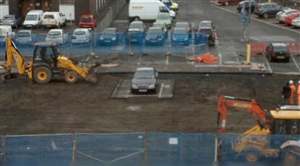 Car park dug up around Merc