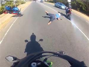 Motorcycle wheelie goes wrong