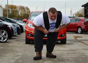 Man pulls 14 cars for charity