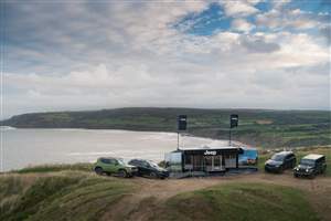 Jeeps on a cliff