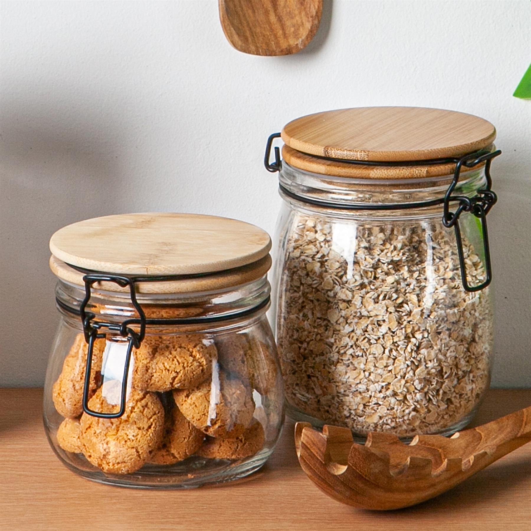 clear storage jars with wooden lids