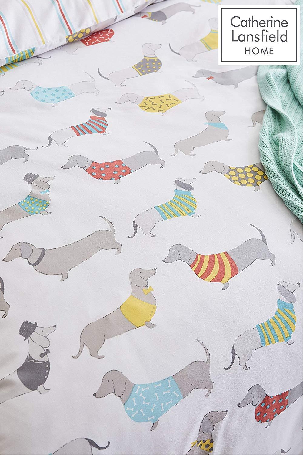 Catherine Lansfield Silly Sausage Dog Reversible Stripe Quilt/Duvet Cover Set Catherine Lansfield Silly Sausage Dog Reversible Stripe Quilt/Duvet Cover Set