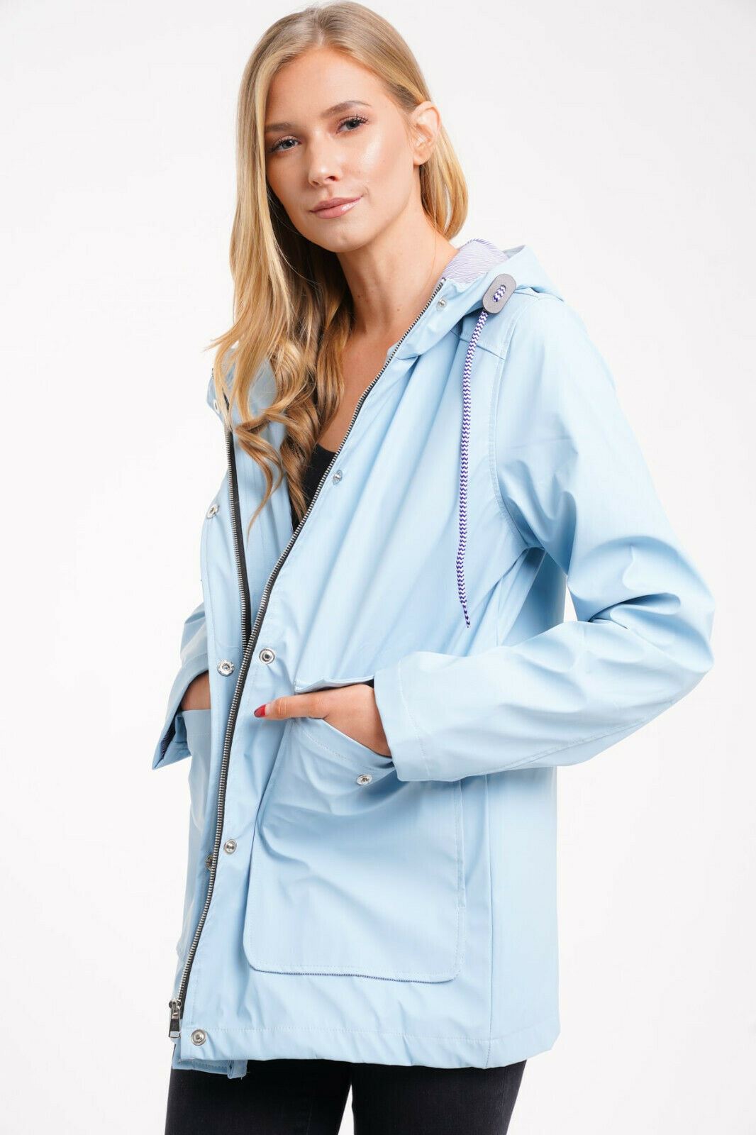 white rubberised rain mac