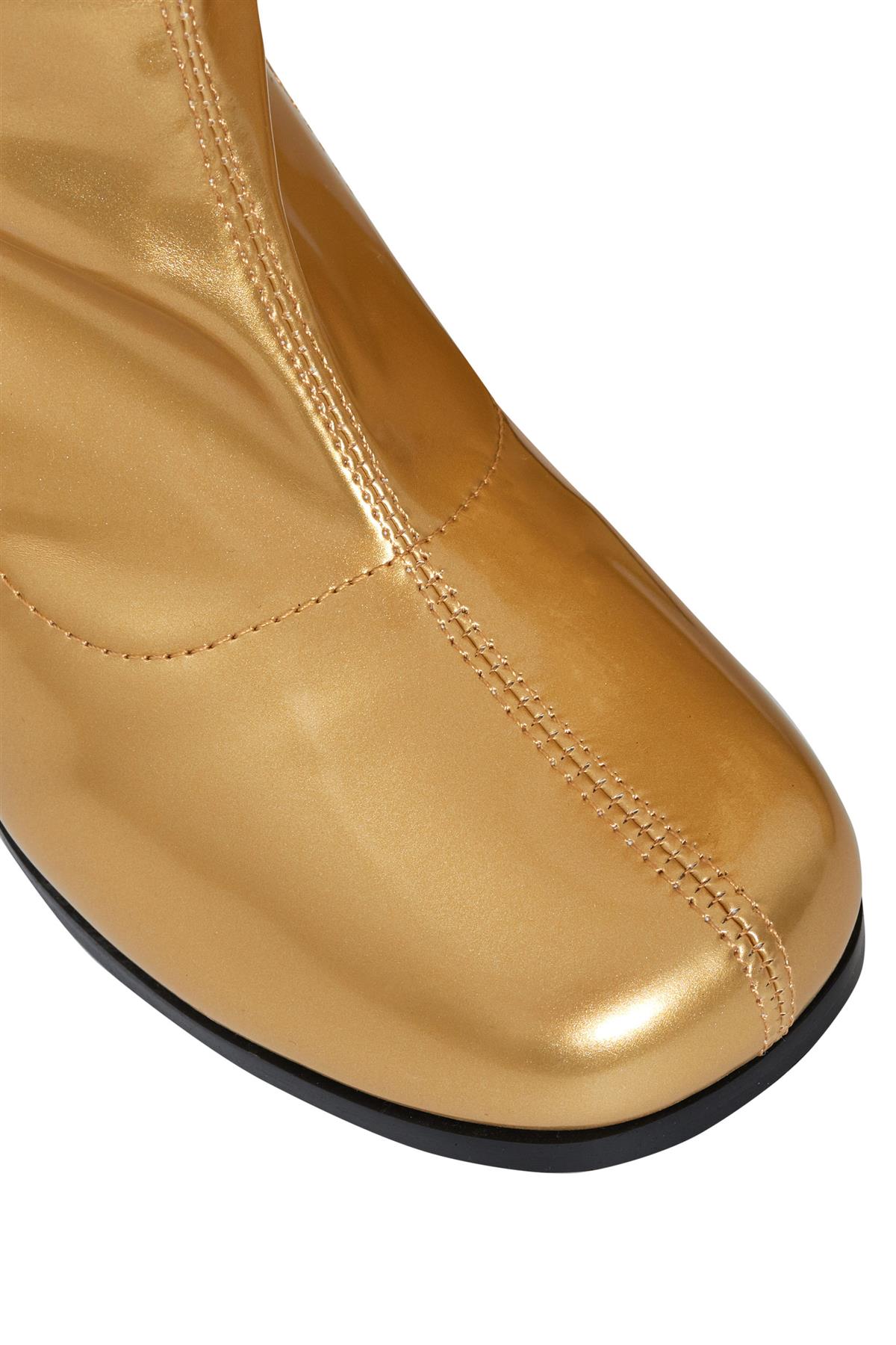 shiny platform boots